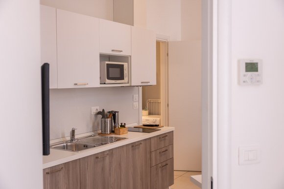 Angolo cucina dell'appartamento Vista Corte